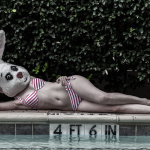 Peronsal Project - White Rabbit: American Bunny posing by her pool