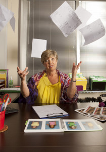 Nancy Campbell throwing up papers in the air for La Mode Magazine shot by Shane Klein Photography