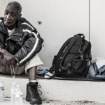 Only Temporary - Homeless in Dallas: Older man and his belongings